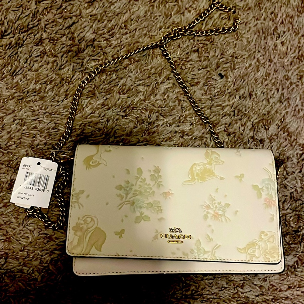 Disney x coach fold over chain clutch new with tags !